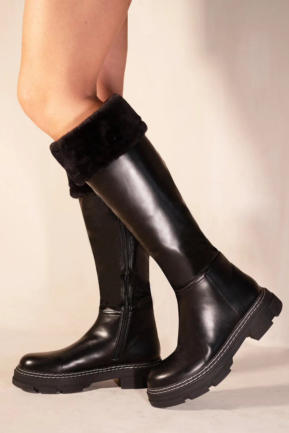 NEVAEY PLATFORM CALF HIGH BOOTS WITH FUR CUFF IN BLACK FAUX LEATHER